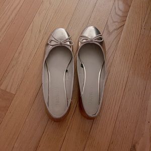 Size 9 rose gold flats.
